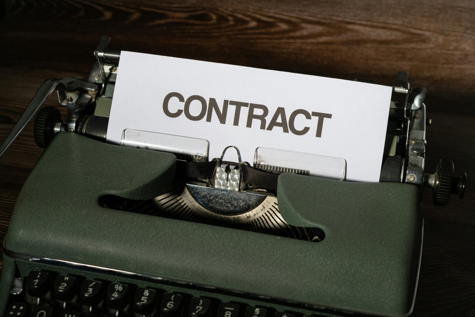 Paralegal conducting detailed contract review and legal consultation